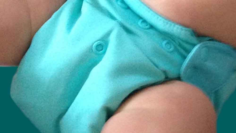 baby wearing cloth diaper with no diaper rash