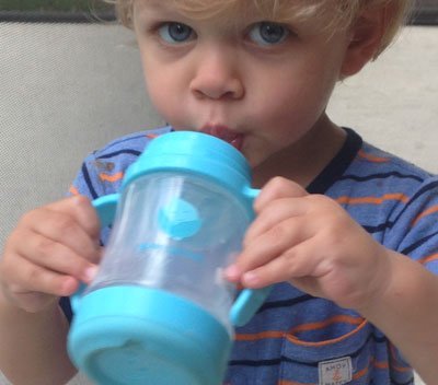 toddler-with-green-sprouts-sippy-cup